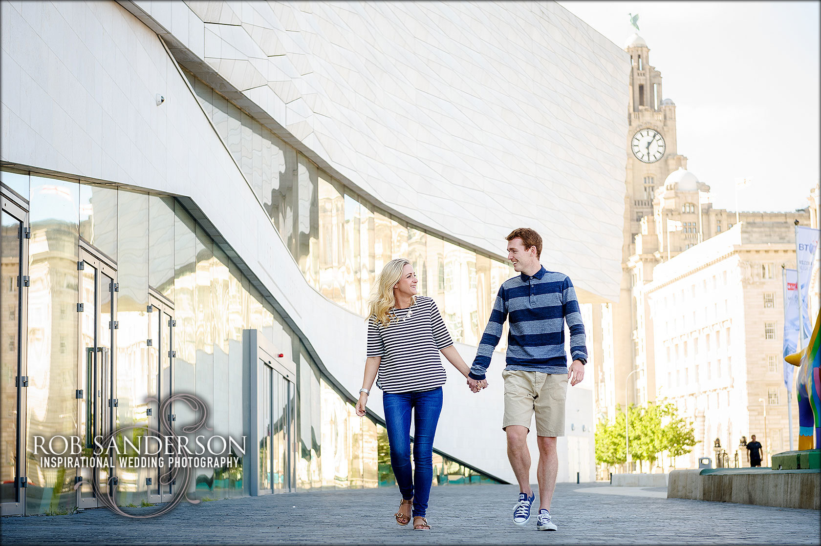 Liverpool engagement photographer with Liver building